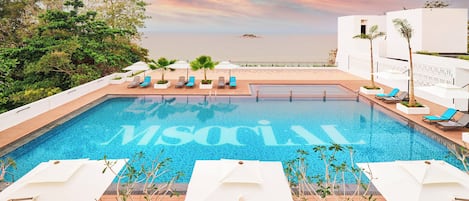 Outdoor pool, open 8:00 AM to 8:00 PM, pool umbrellas, sun loungers