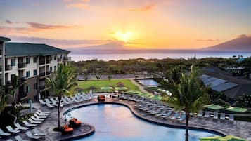 Outdoor pool, free pool cabanas, pool umbrellas