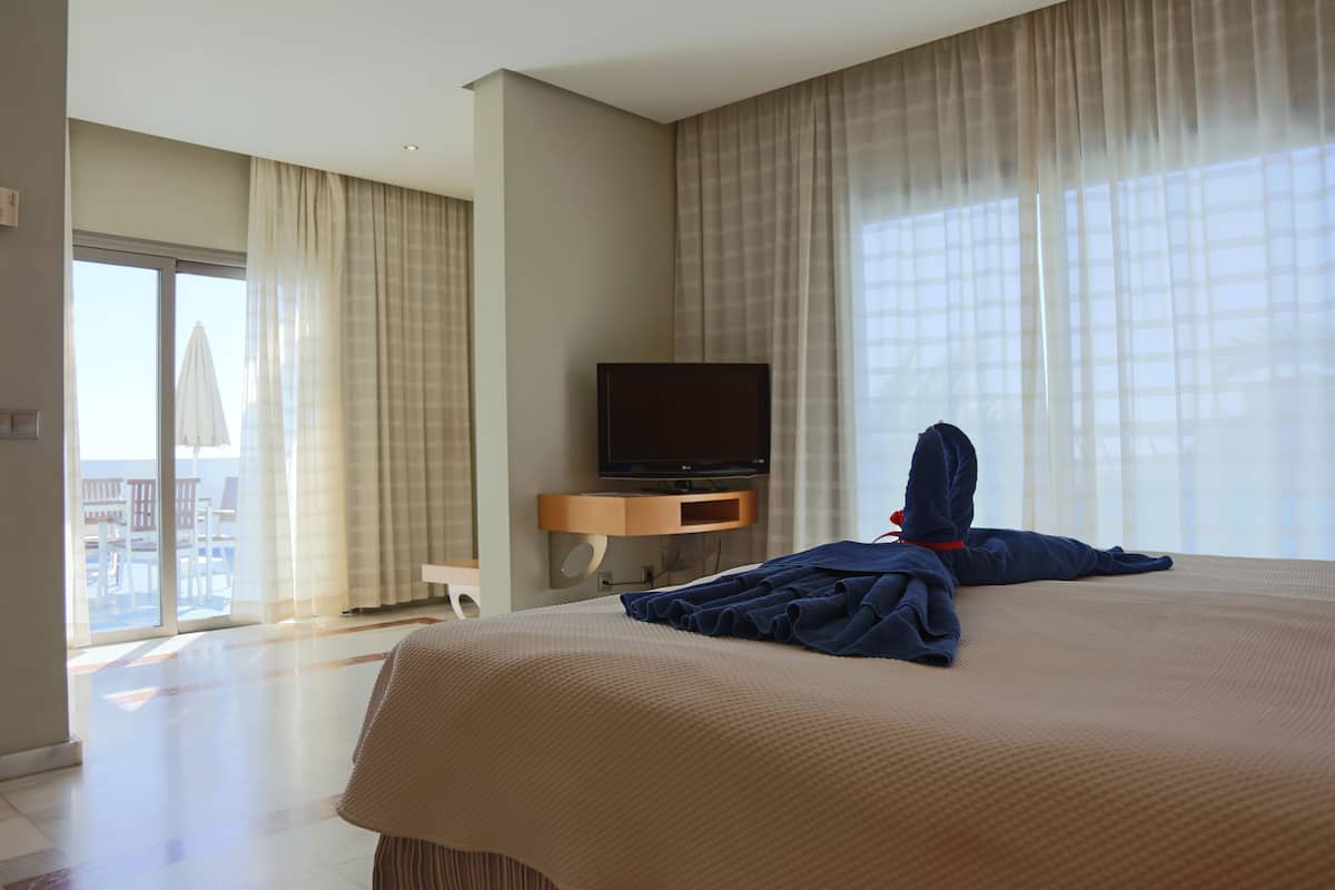 Desk, blackout curtains, iron/ironing board, free cots/infant beds