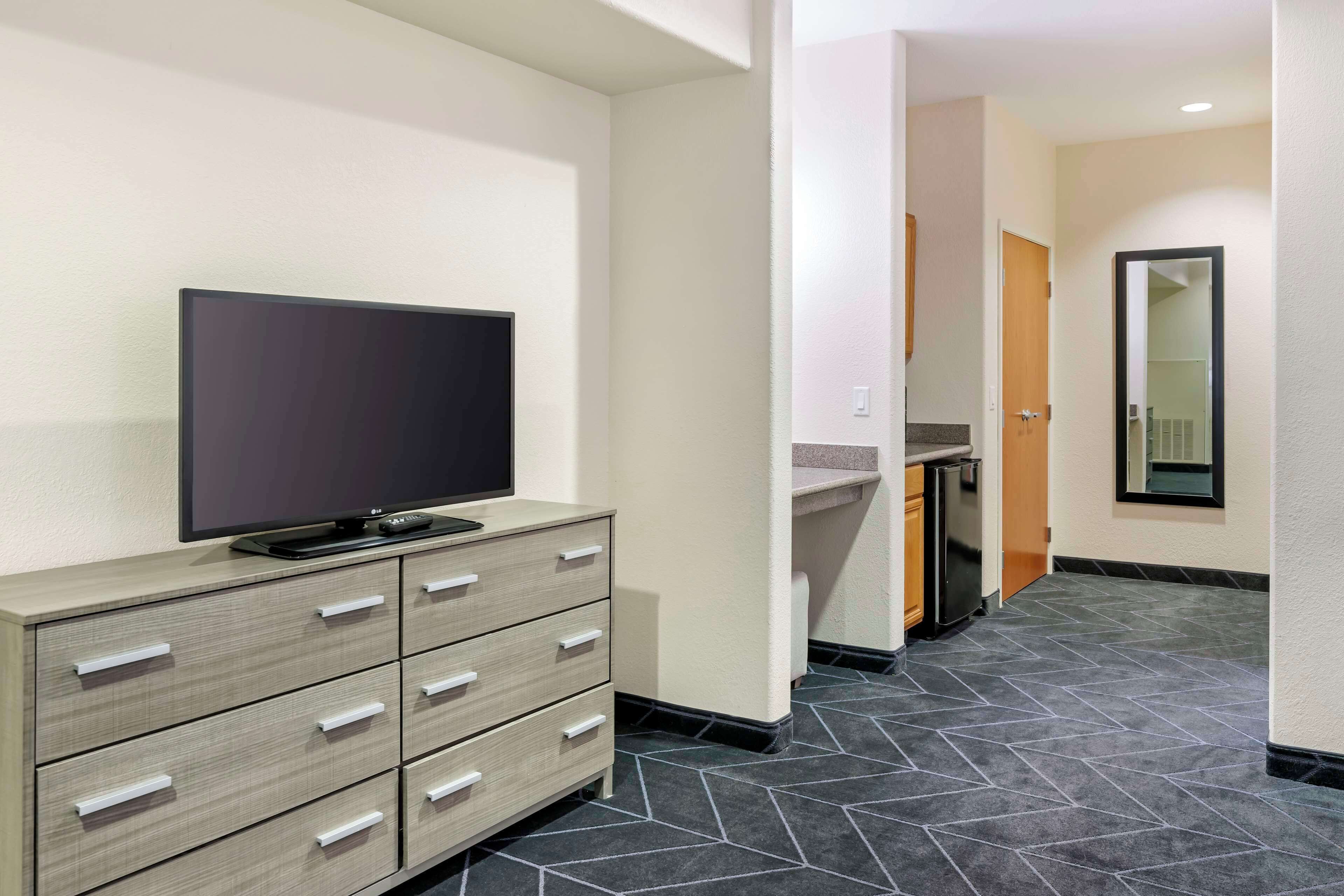 standard room, 2 queen beds, bathtub | in-room safe, desk, laptop workspace, iron/ironing board