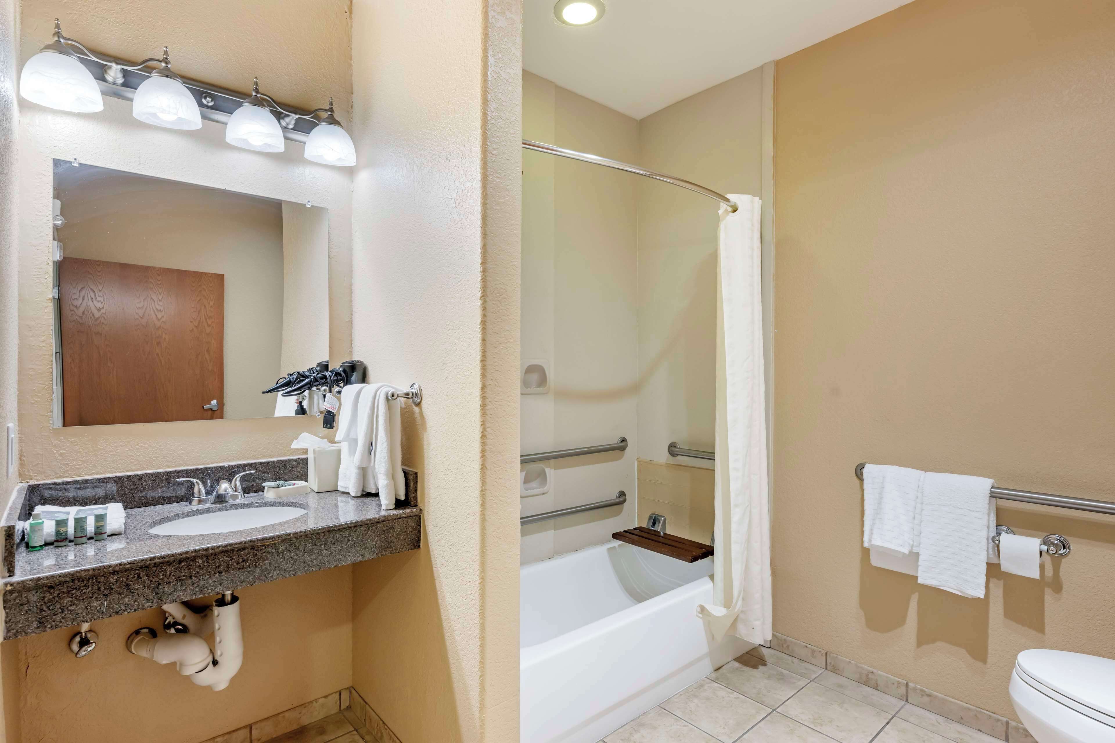 standard room, 2 queen beds, bathtub | bathroom | combined shower/bathtub, free toiletries, hair dryer, towels