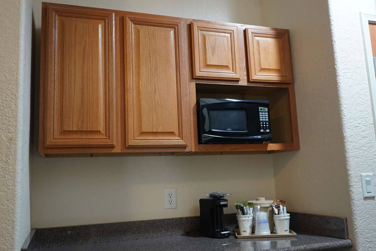 suite, 1 king bed, accessible, non smoking (with sofabed) | in-room safe, desk, laptop workspace, iron/ironing board