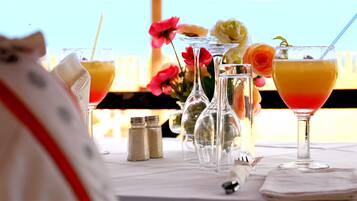 Breakfast, lunch, dinner served; local cuisine, beach views
