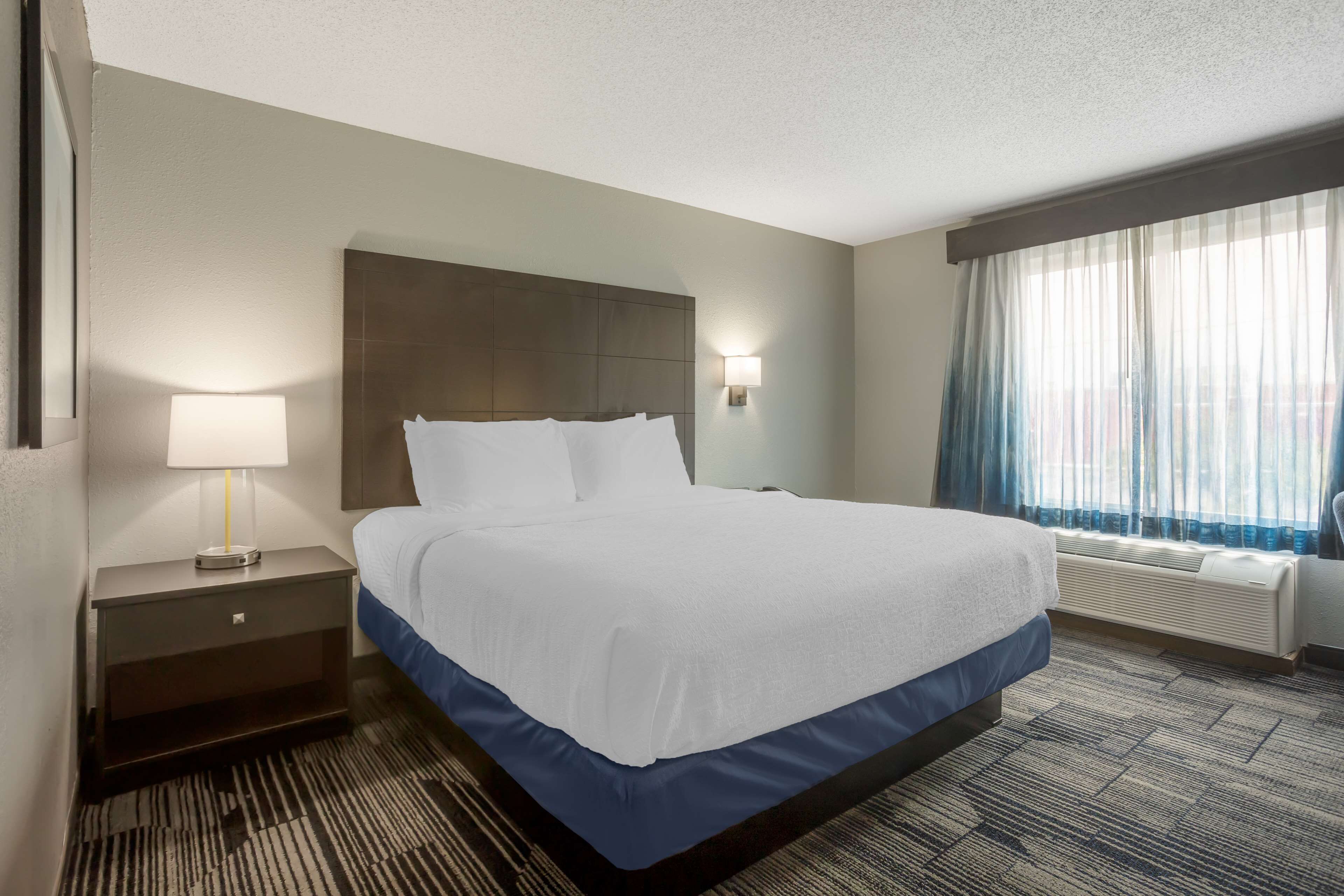 Down comforters, pillowtop beds, desk, blackout drapes