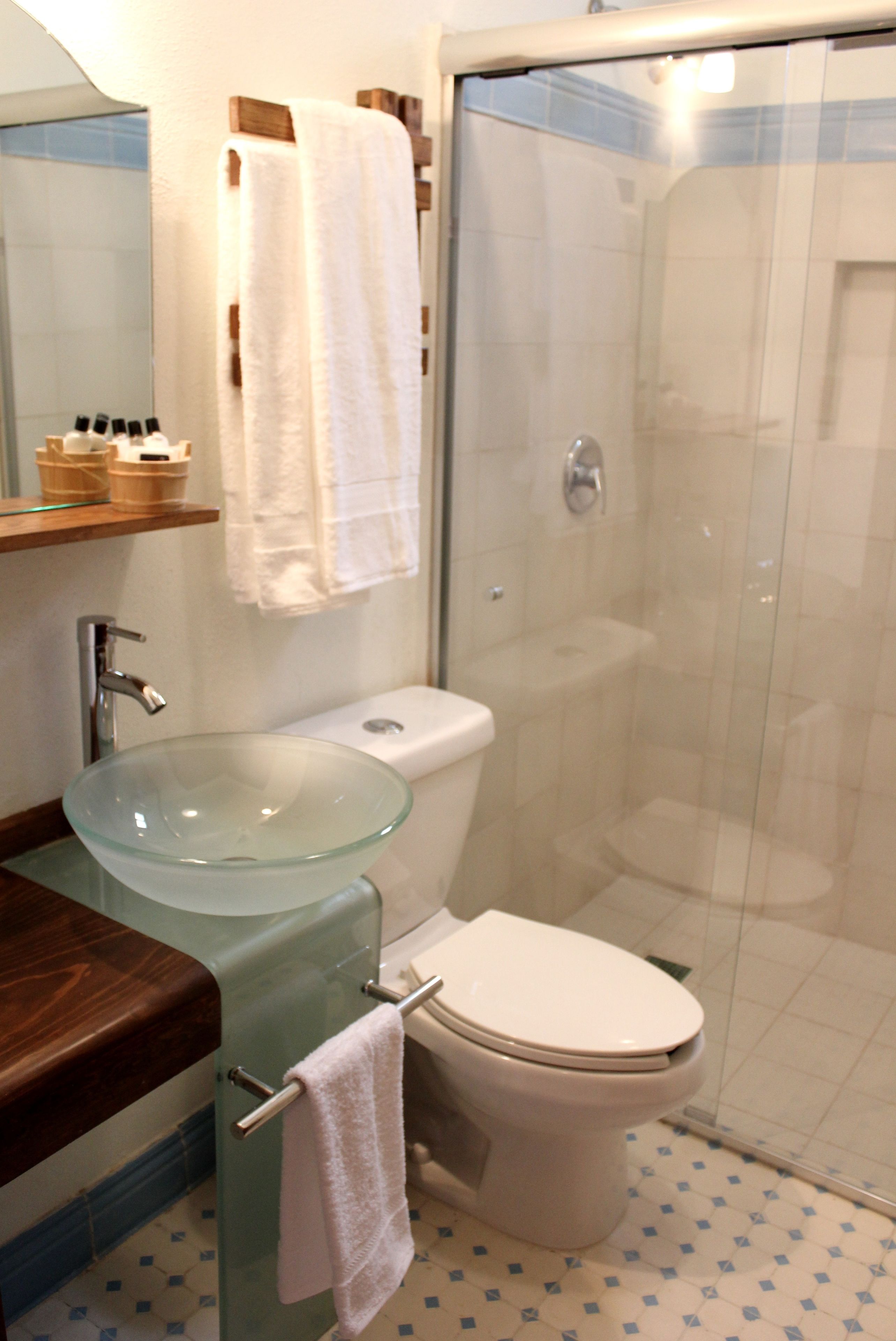 deluxe room | bathroom | shower, designer toiletries, hair dryer, towels