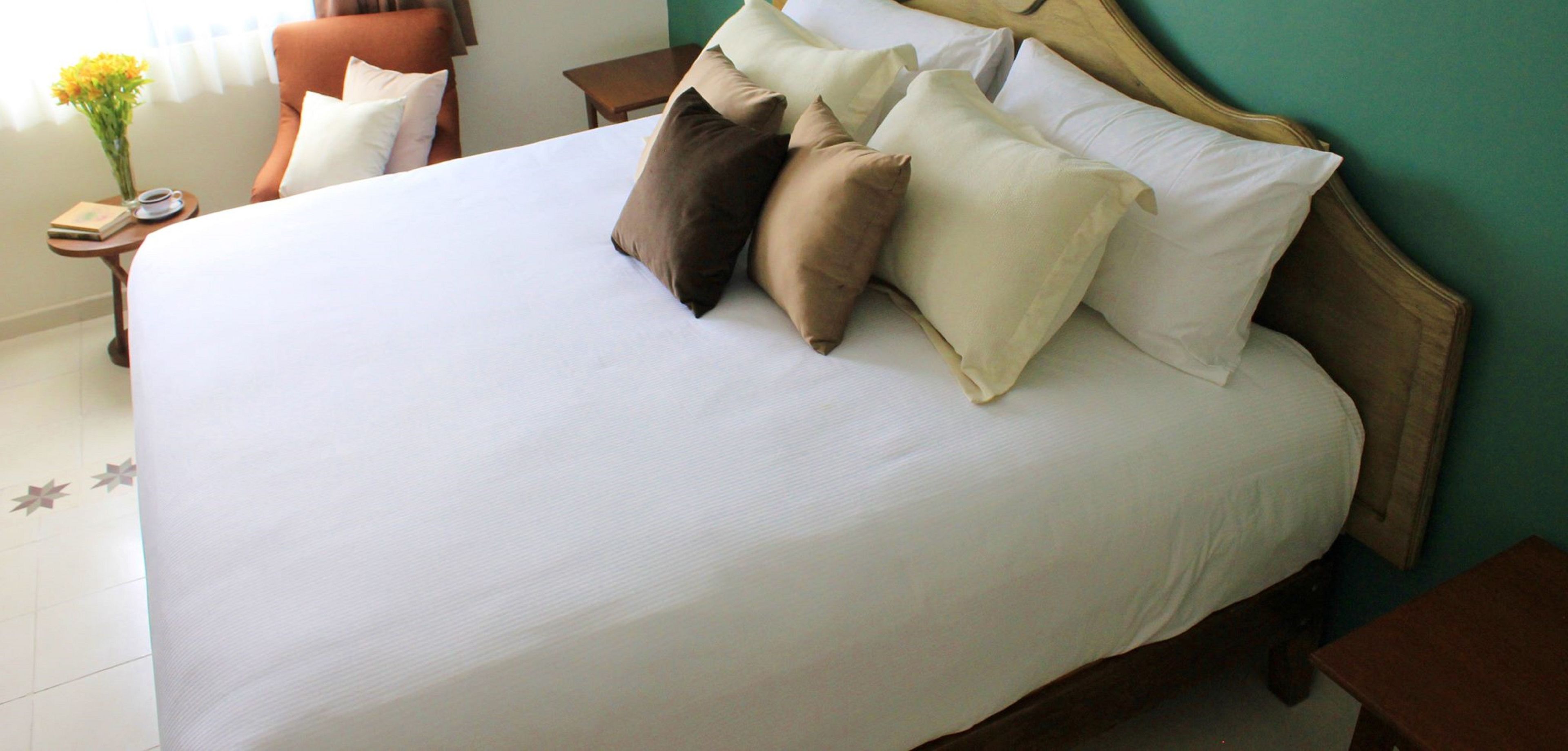 room | premium bedding, down duvets, in-room safe, individually decorated