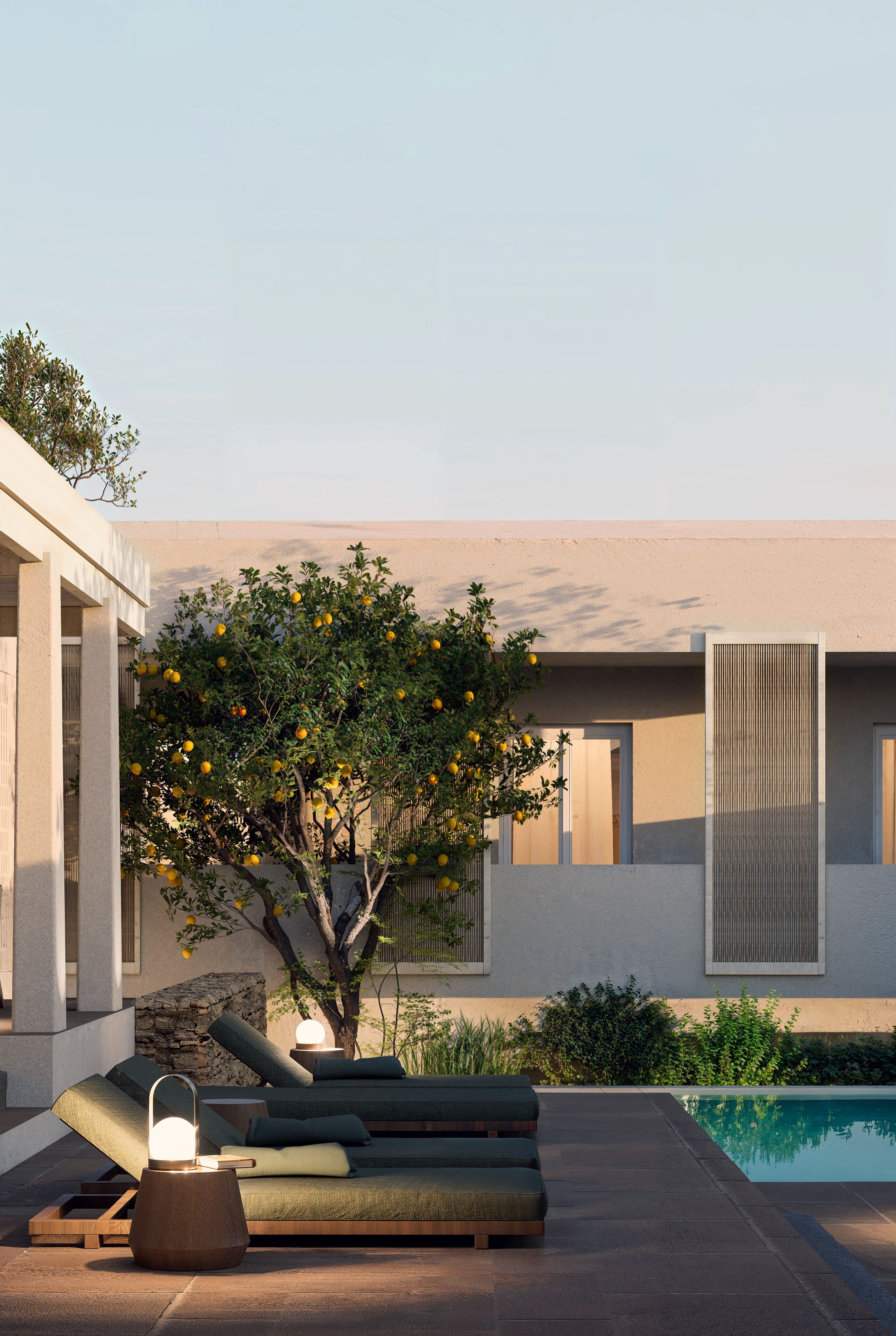 A modern outdoor lounge area with a pool, a tree with yellow fruit, and a minimalist architectural design.