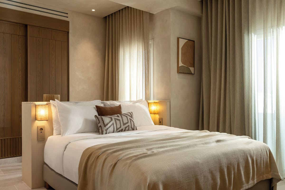 Junior Suite with Balcony | Minibar, in-room safe, soundproofing, iron/ironing board (on request)