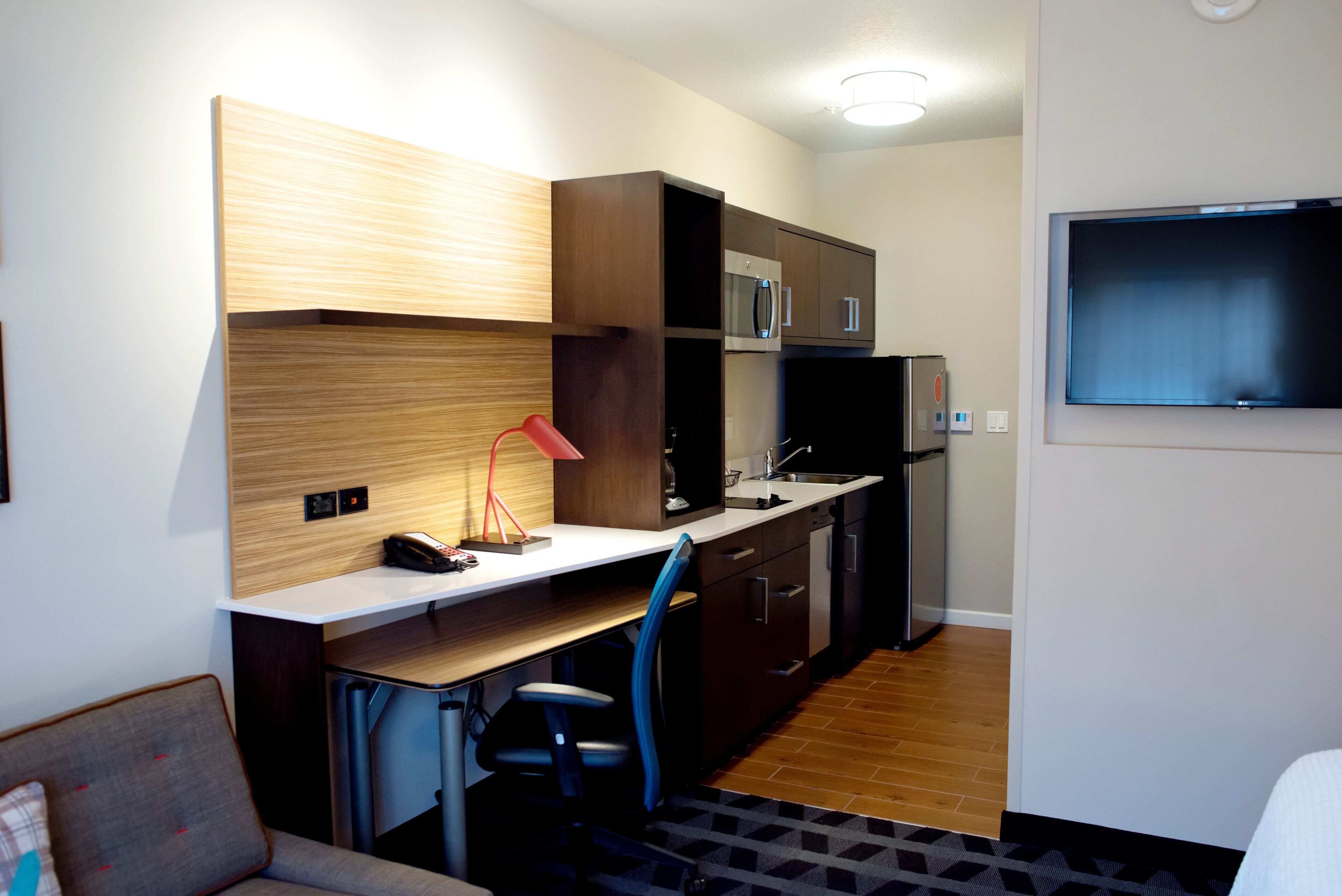 full-sized fridge, microwave, stovetop, dishwasher