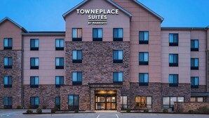 A multi-story hotel with a prominent sign reading "Towneplace Suites by Marriott". - TownePlace Suites by Marriott Ames (Ames)