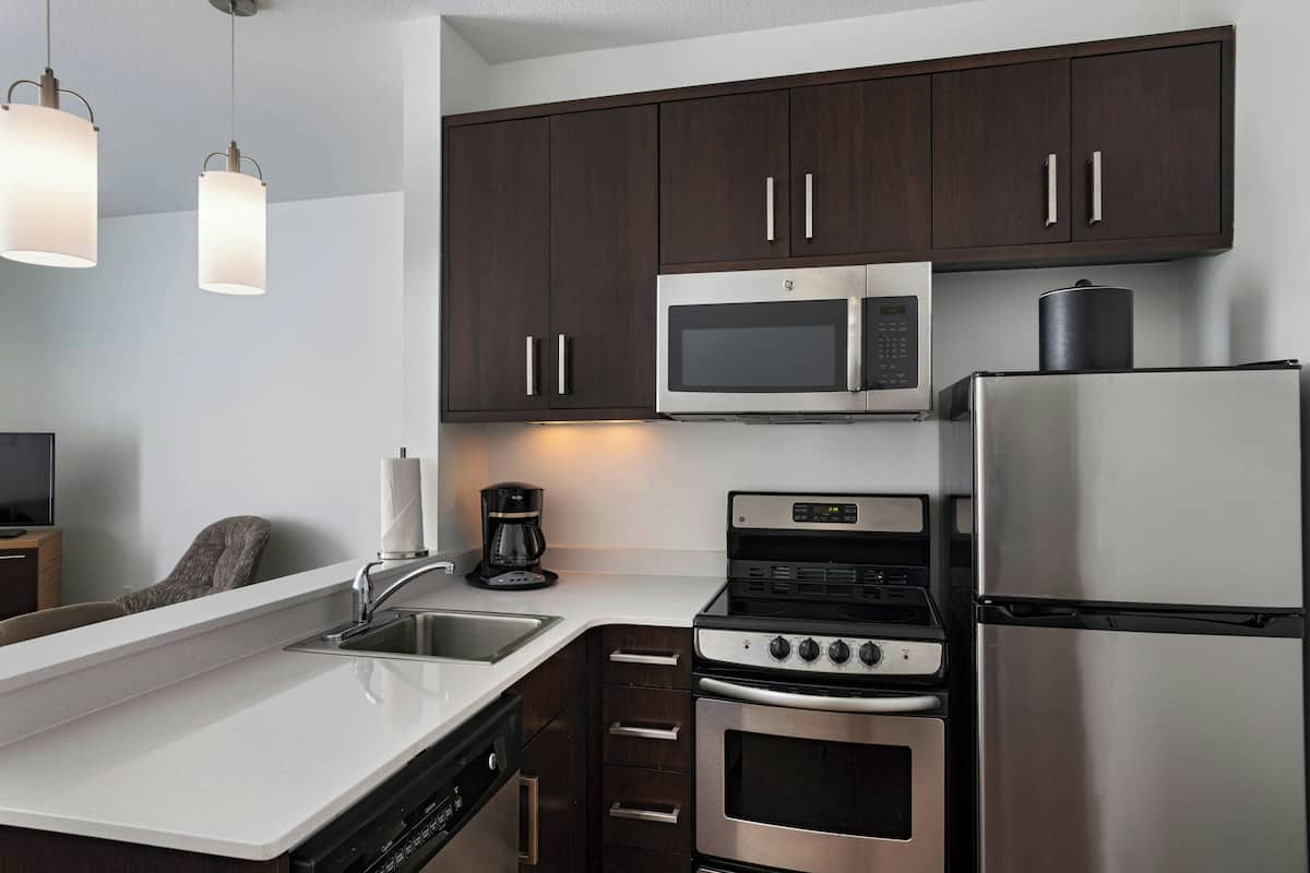 Suite, 1 Bedroom | Desk, iron/ironing board, free WiFi, bed sheets