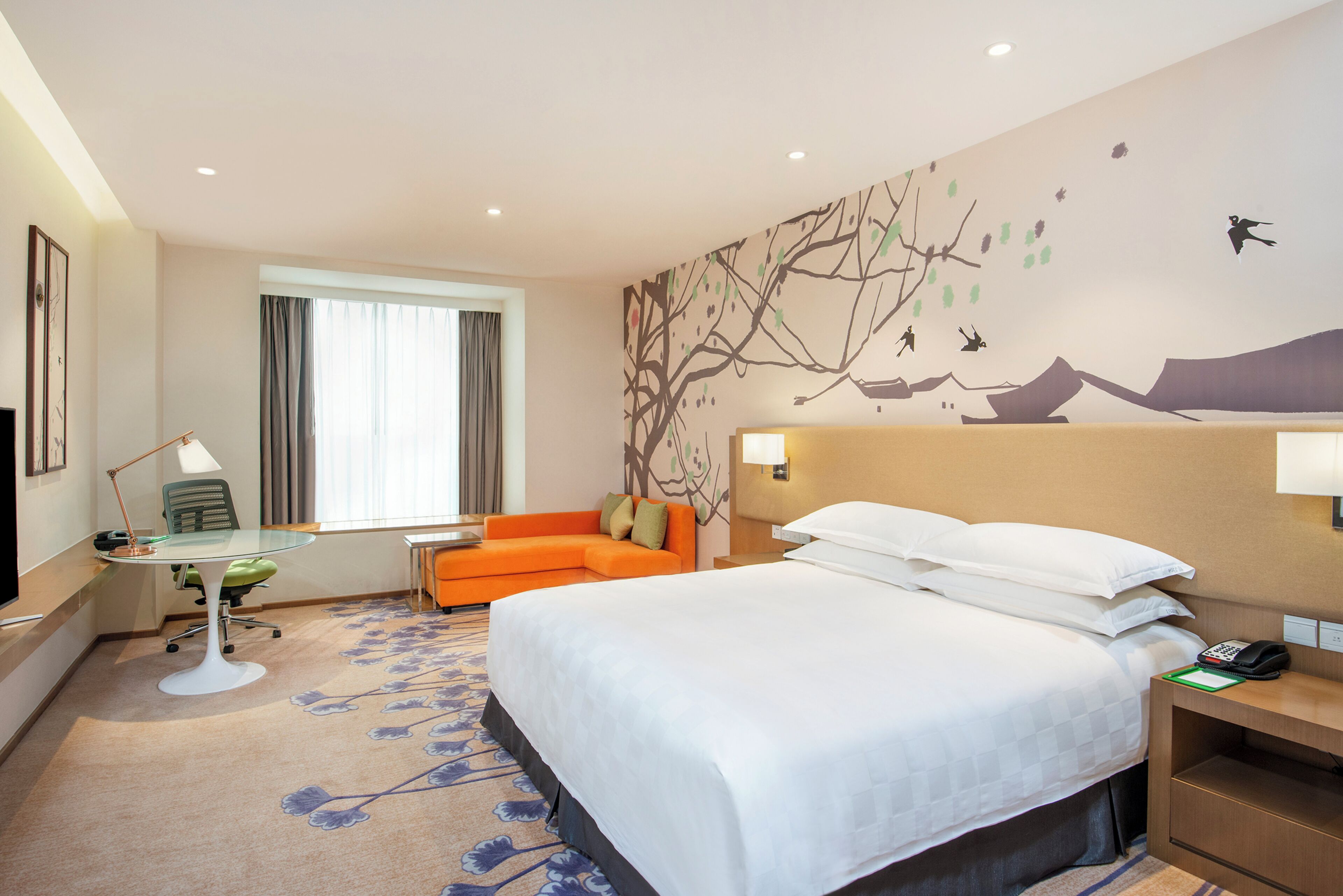 Premium bedding, down comforters, minibar, in-room safe