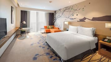 Ropa de cama de alta calidad, edredones de plumas, minibar y caja fuerte