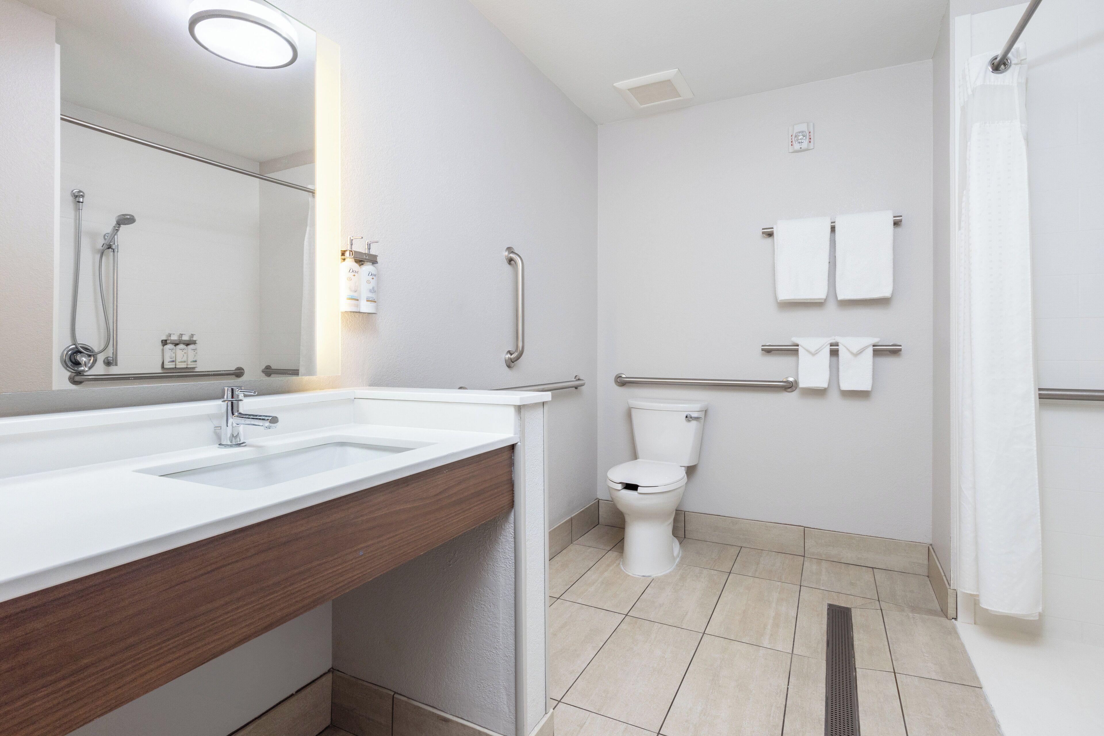 premium bedding, pillow-top beds, desk, laptop workspace