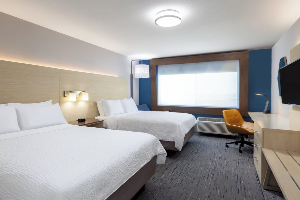 Premium bedding, pillowtop beds, desk, laptop workspace