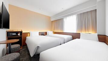 Quartos à prova de som, Wi-Fi de cortesia, roupa de cama