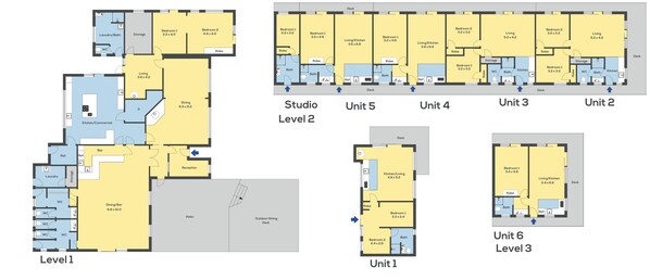 A hotel layout with multiple units, each featuring a kitchen, living area, and two bedrooms.