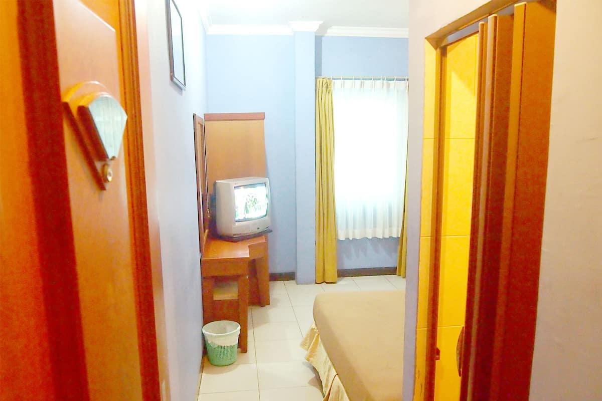 Habitación superior | Caja fuerte, escritorio, camas supletorias y wifi gratis