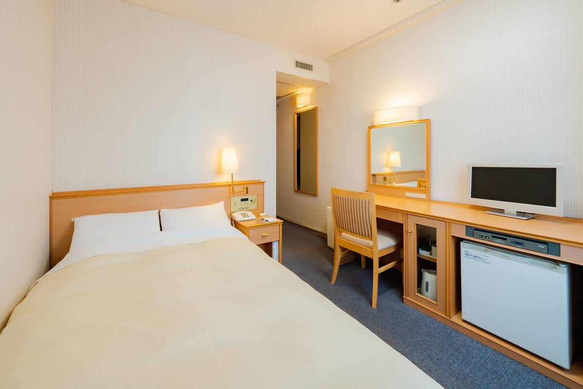 Desk, blackout drapes, iron/ironing board (on request), WiFi (free)