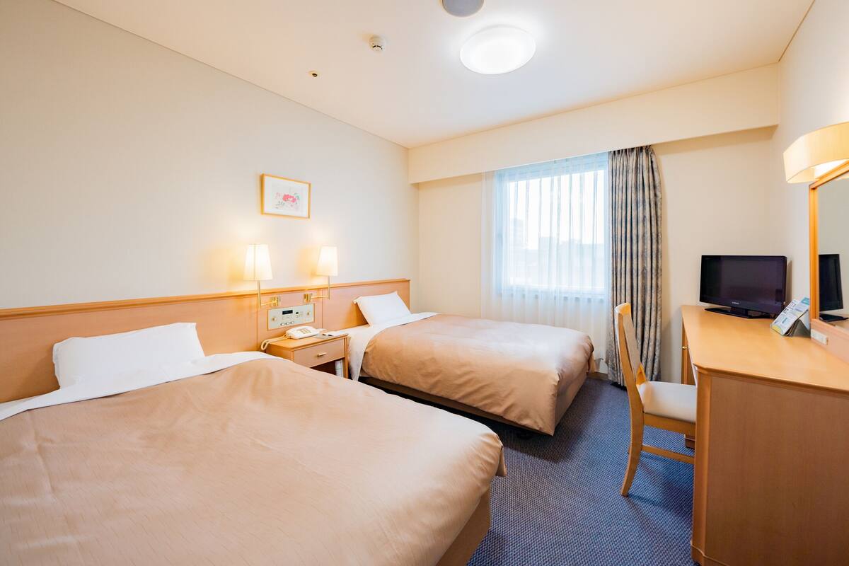 Desk, blackout drapes, iron/ironing board (on request), WiFi (free)