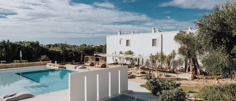 Outdoor pool, pool umbrellas, pool loungers