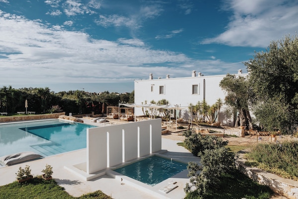 Outdoor pool, pool umbrellas, pool loungers