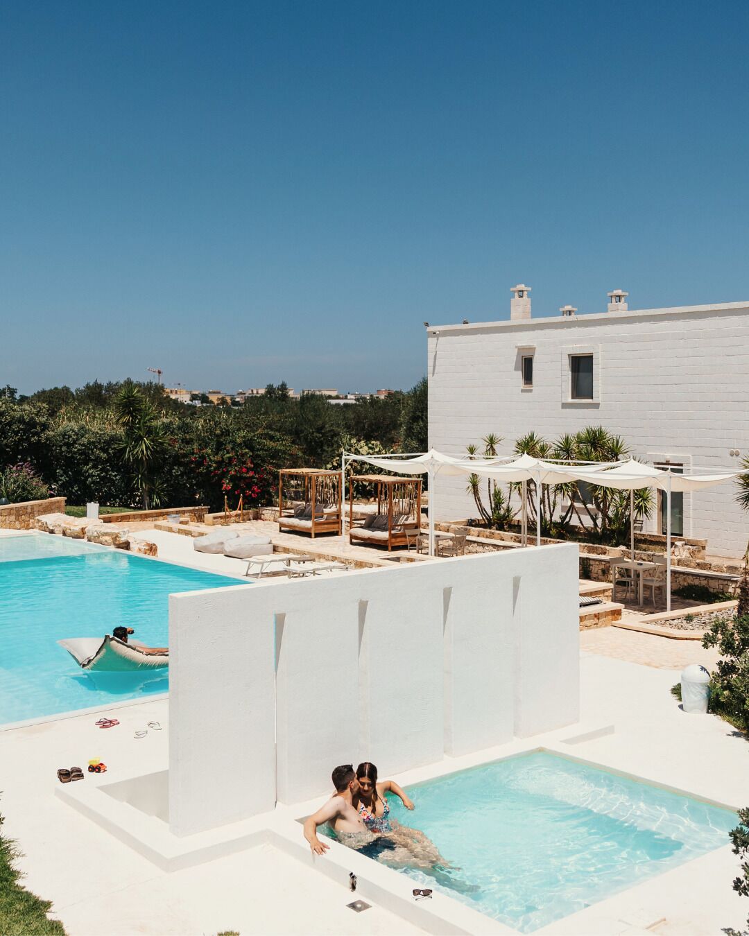 Outdoor pool, pool umbrellas, sun loungers