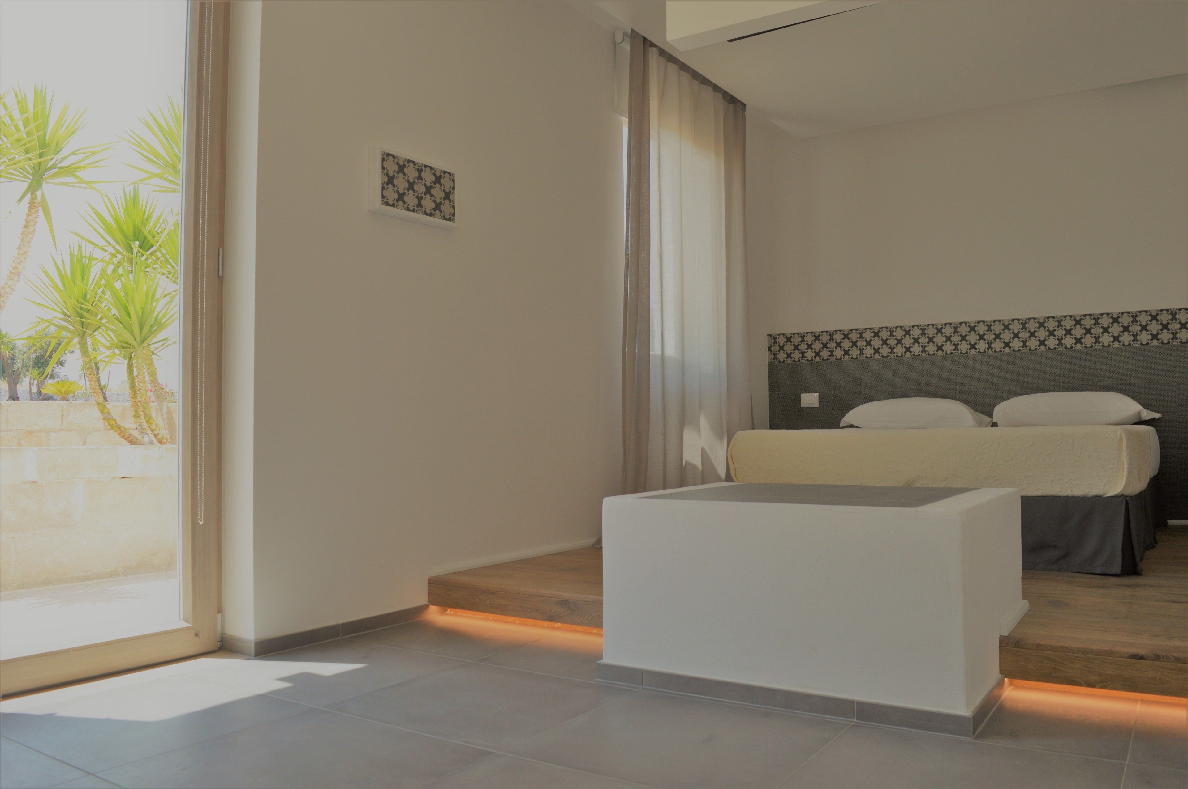 junior double room, 1 double bed, non smoking, garden area | minibar, in-room safe, individually decorated, individually furnished