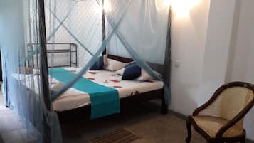 Standard Room, Garden View (With Fan) | In-room safe, desk, soundproofing, iron/ironing board