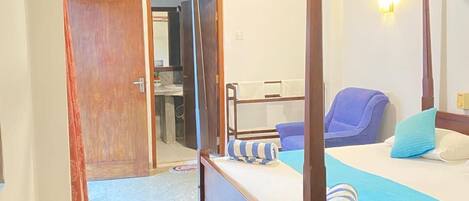 Standard Room, Garden View (With Fan) | In-room safe, desk, soundproofing, iron/ironing board