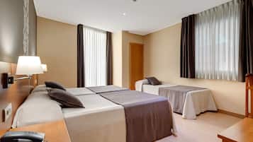 Standard Triple Room, 1 Bedroom | Minibar, desk, blackout drapes, free WiFi