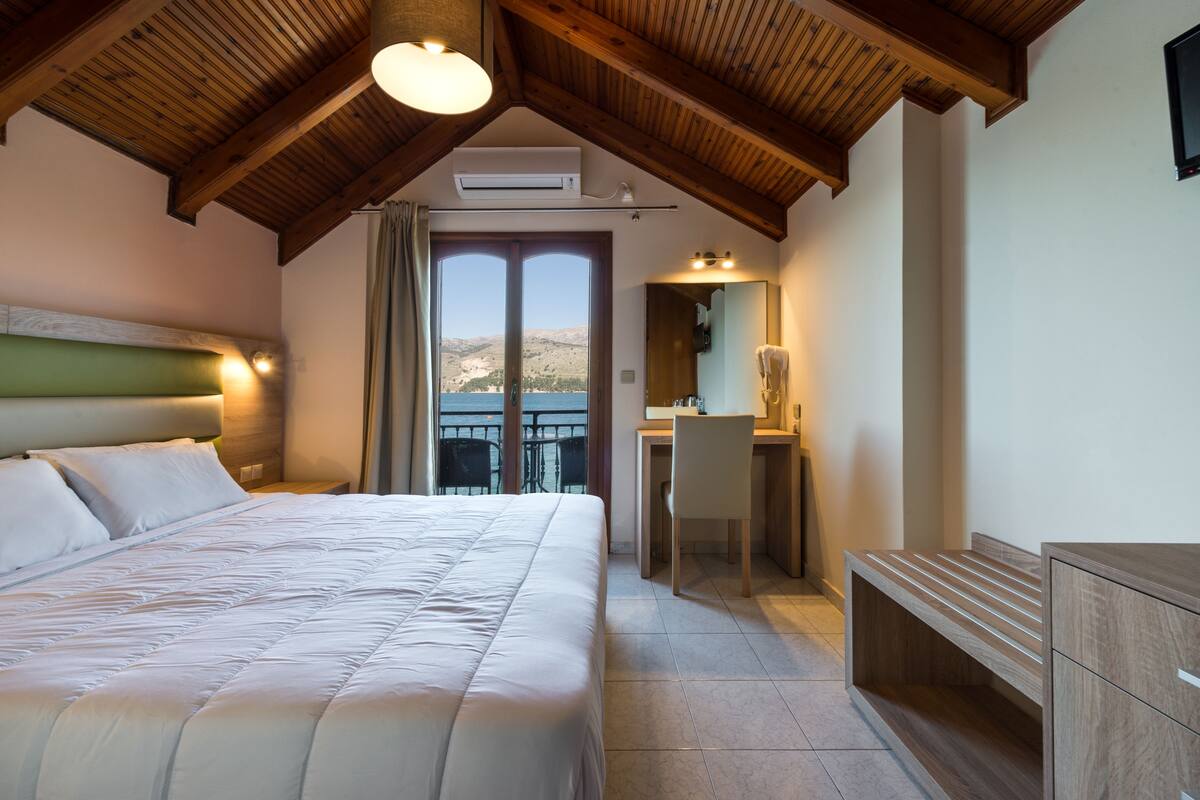 superior double or twin room, sea view | minibar, in-room safe, desk, iron/ironing board