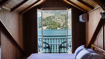 Superior Double or Twin Room, Sea View | Minibar, in-room safe, desk, iron/ironing board