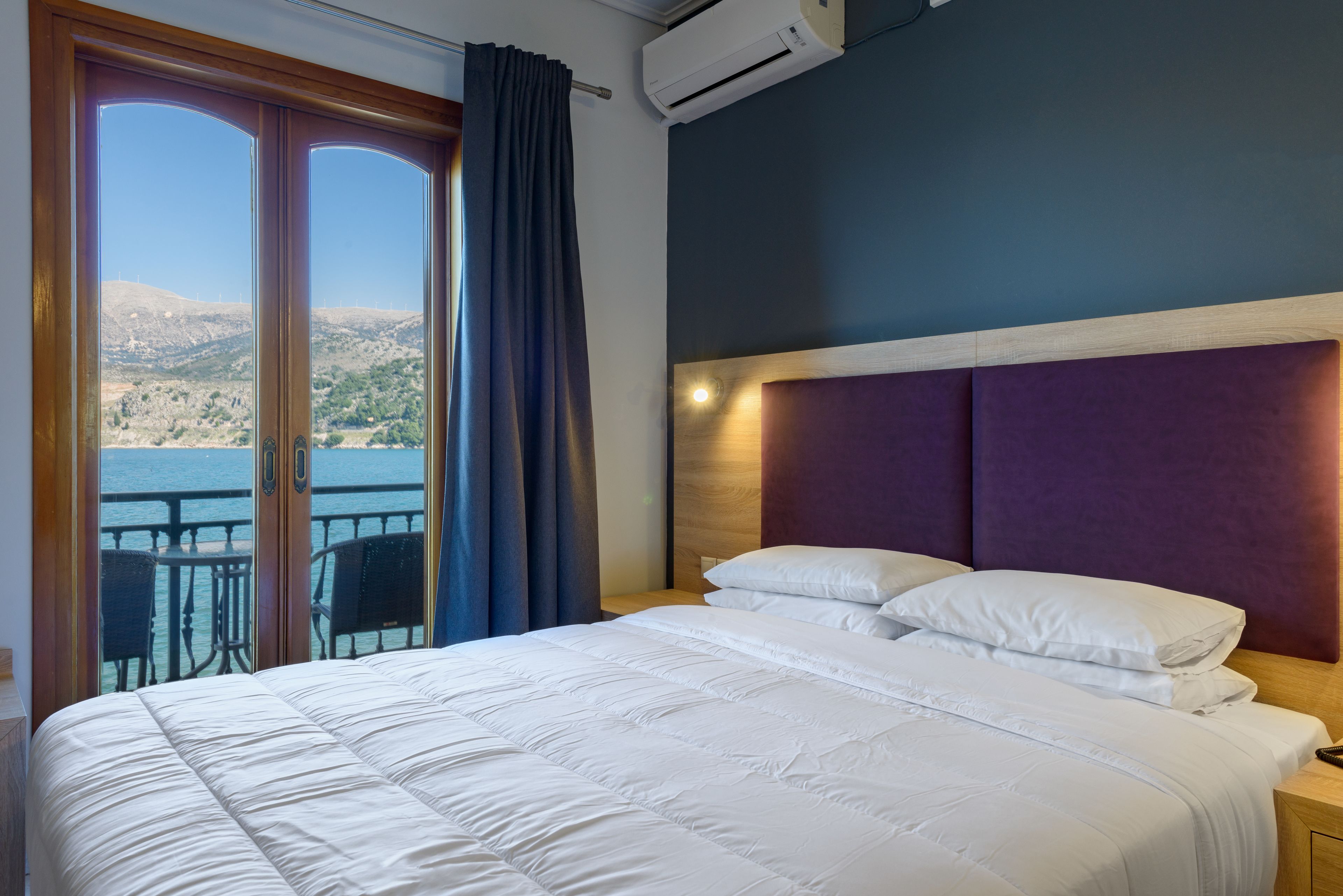 superior double or twin room, sea view | minibar, in-room safe, desk, iron/ironing board