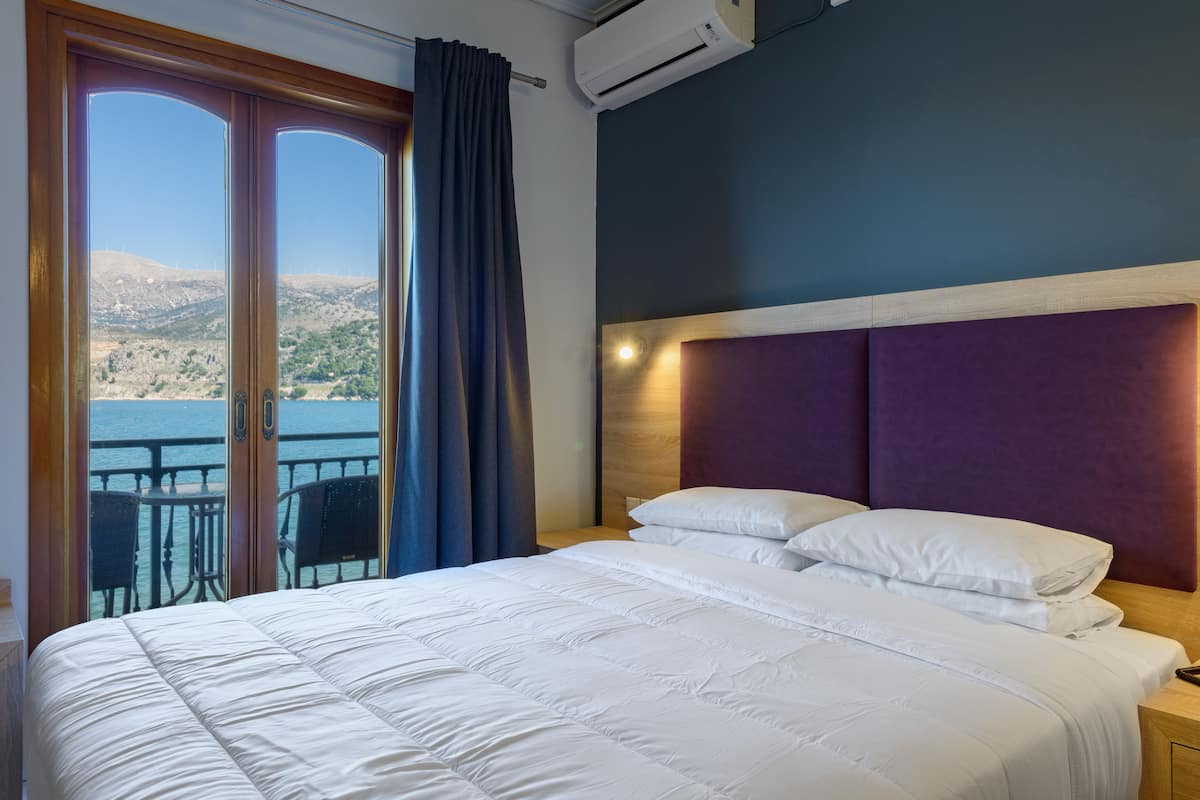 superior double or twin room, sea view | minibar, in-room safe, desk, iron/ironing board