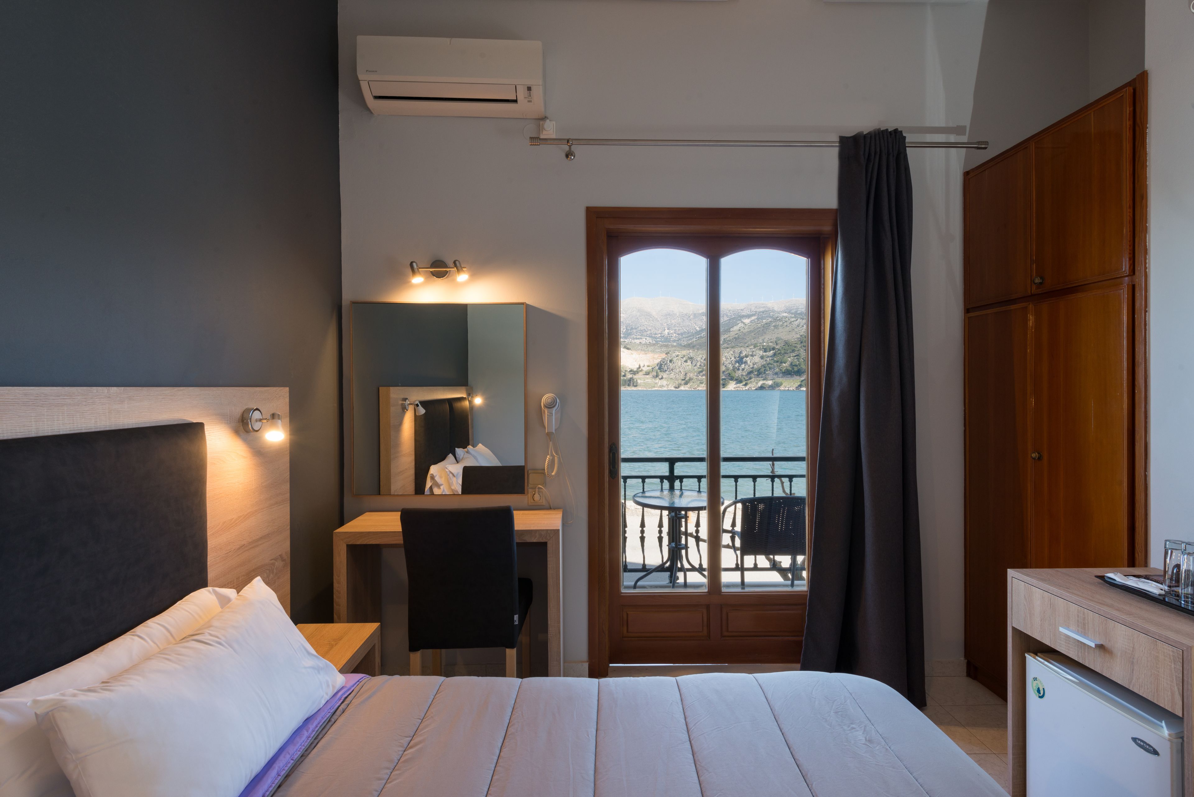 superior double or twin room, sea view | minibar, in-room safe, desk, iron/ironing board