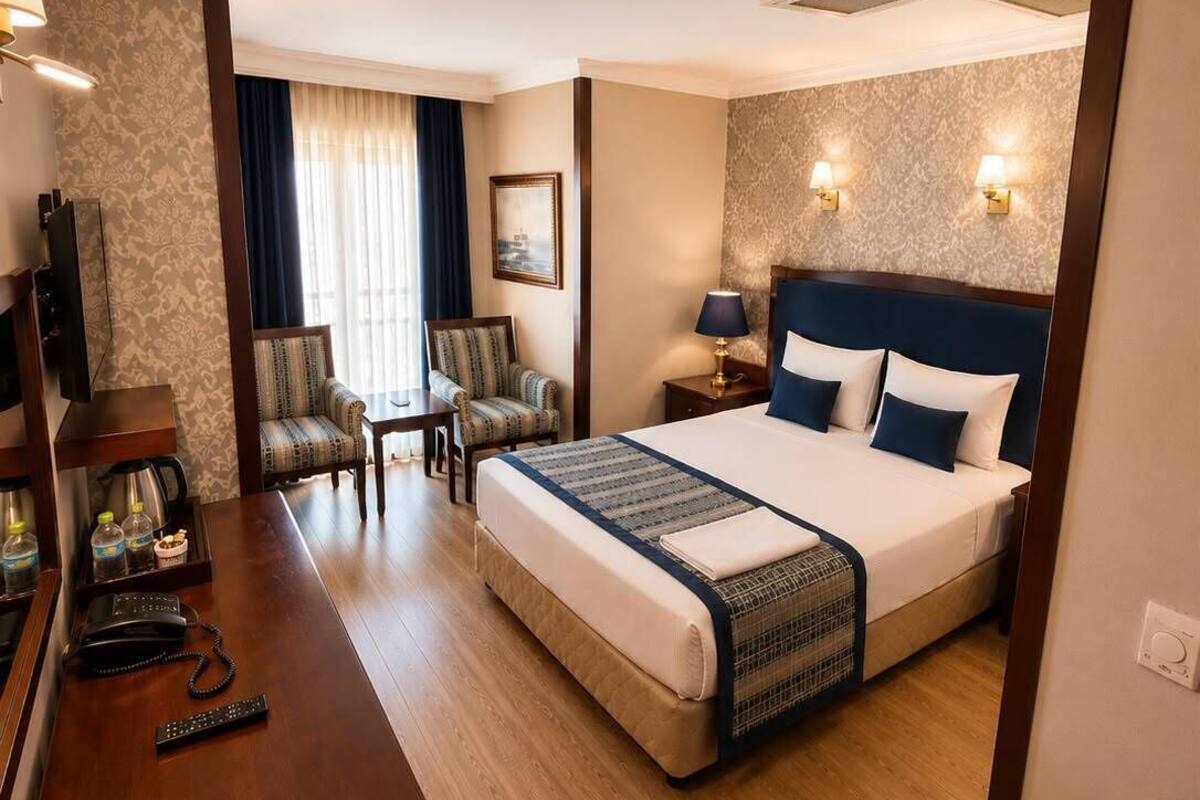 Economy Double Room, Smoking, City View | Premium bedding, minibar, in-room safe, desk