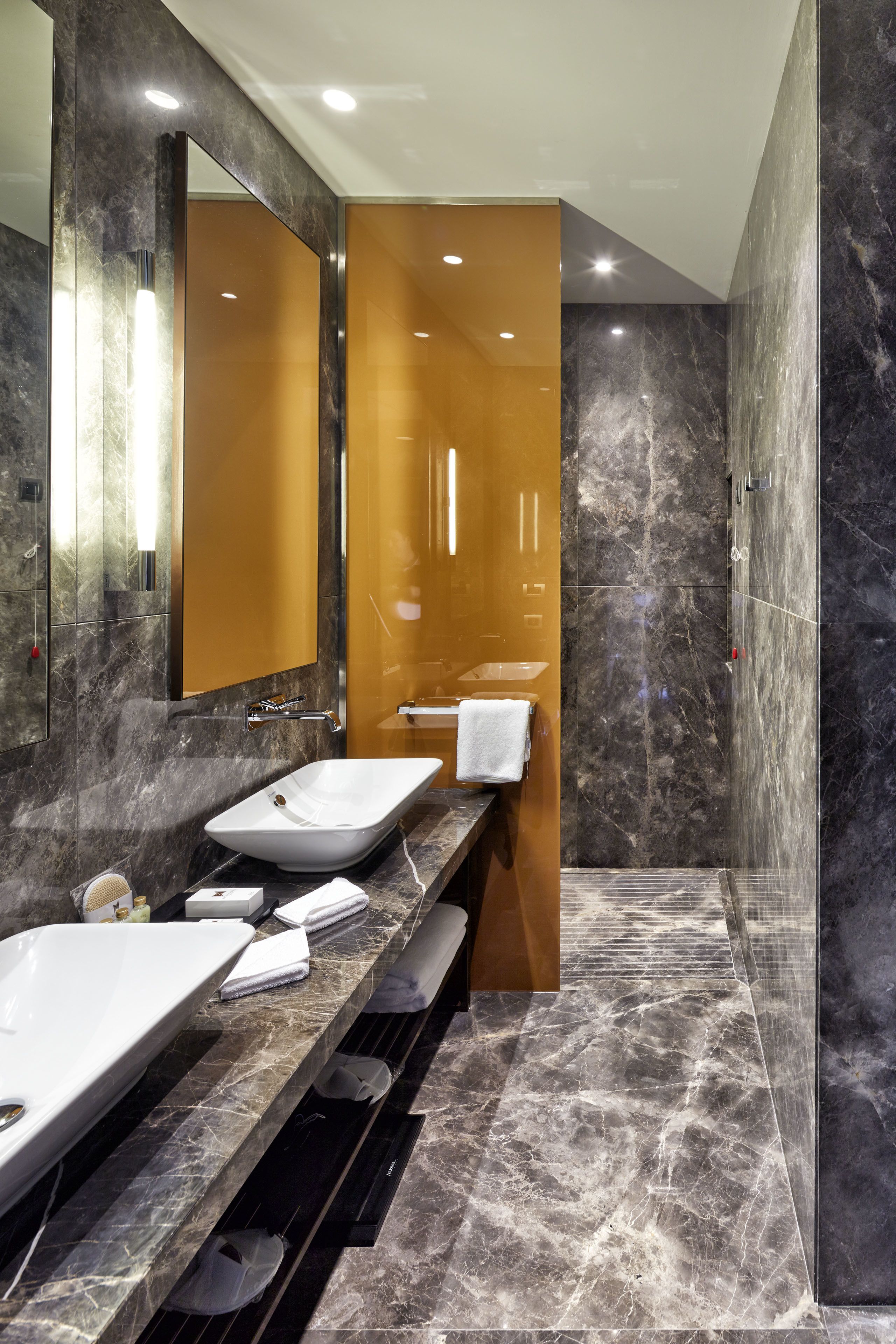 designer toiletries, hair dryer, bathrobes, slippers