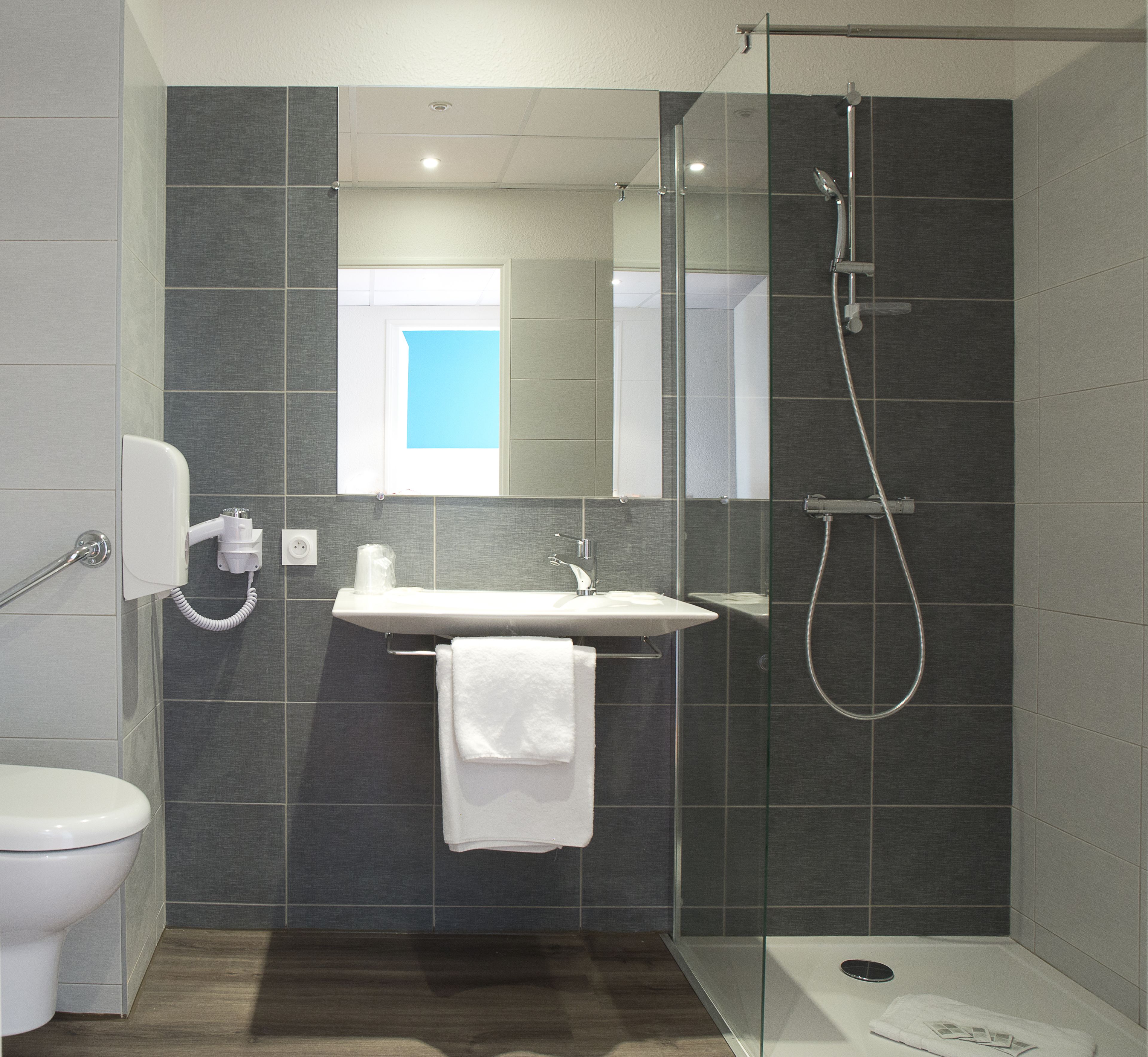 quadruple room | bathroom | shower, free toiletries, hair dryer, towels