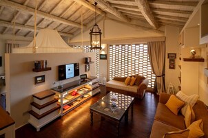 Suite, 1 Bedroom | Living area | Flat-screen TV