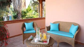 Luxury Suite, 1 King Bed, Bathtub, Park View | Terrace/patio
