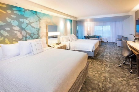 Desk, blackout drapes, iron/ironing board, free cribs/infant beds