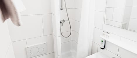 Shower, free toiletries, hair dryer, towels