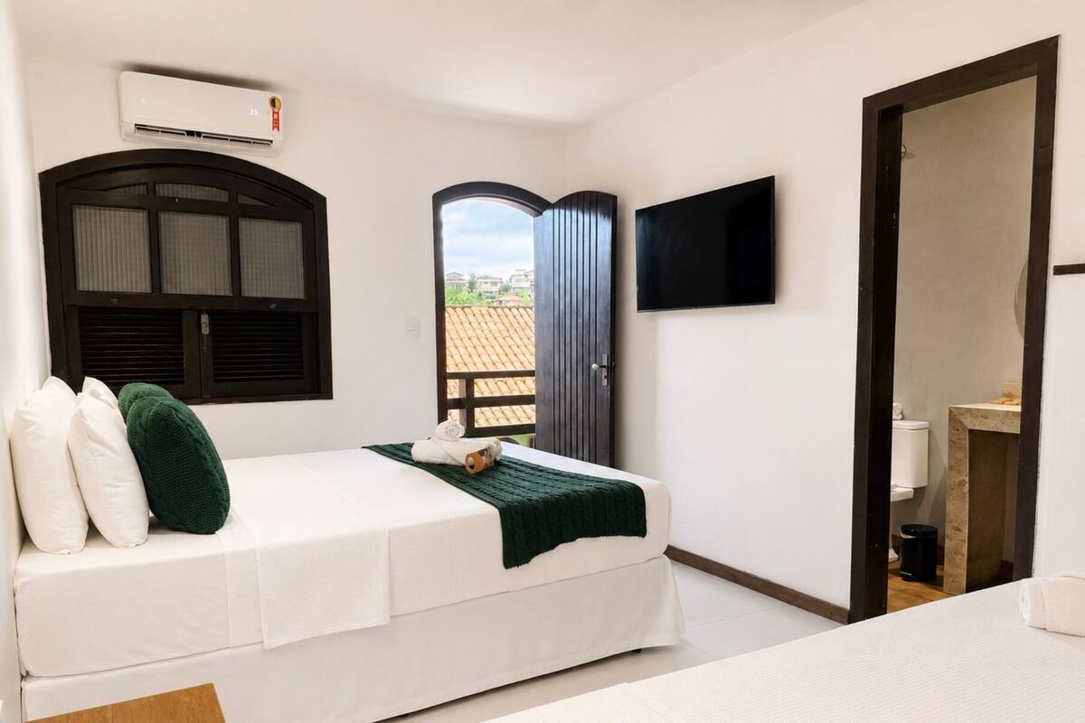 Family Room | Minibar, WiFi (free), bed sheets