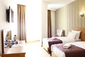 Ropa de cama de alta calidad y minibar