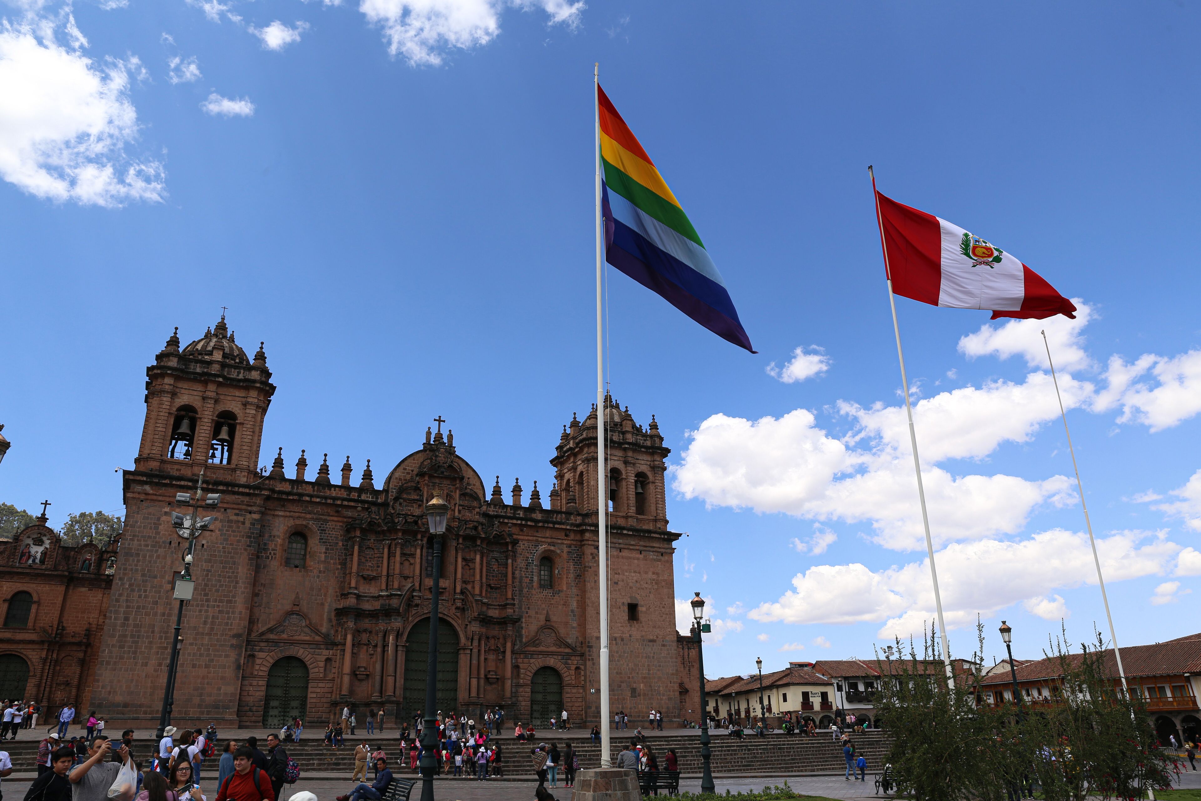 A historic building with a large central dome and two bell towers.