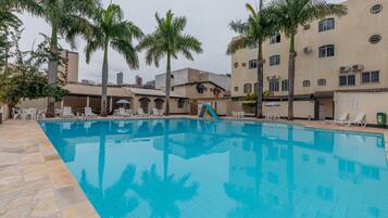 Outdoor pool, pool umbrellas, sun loungers