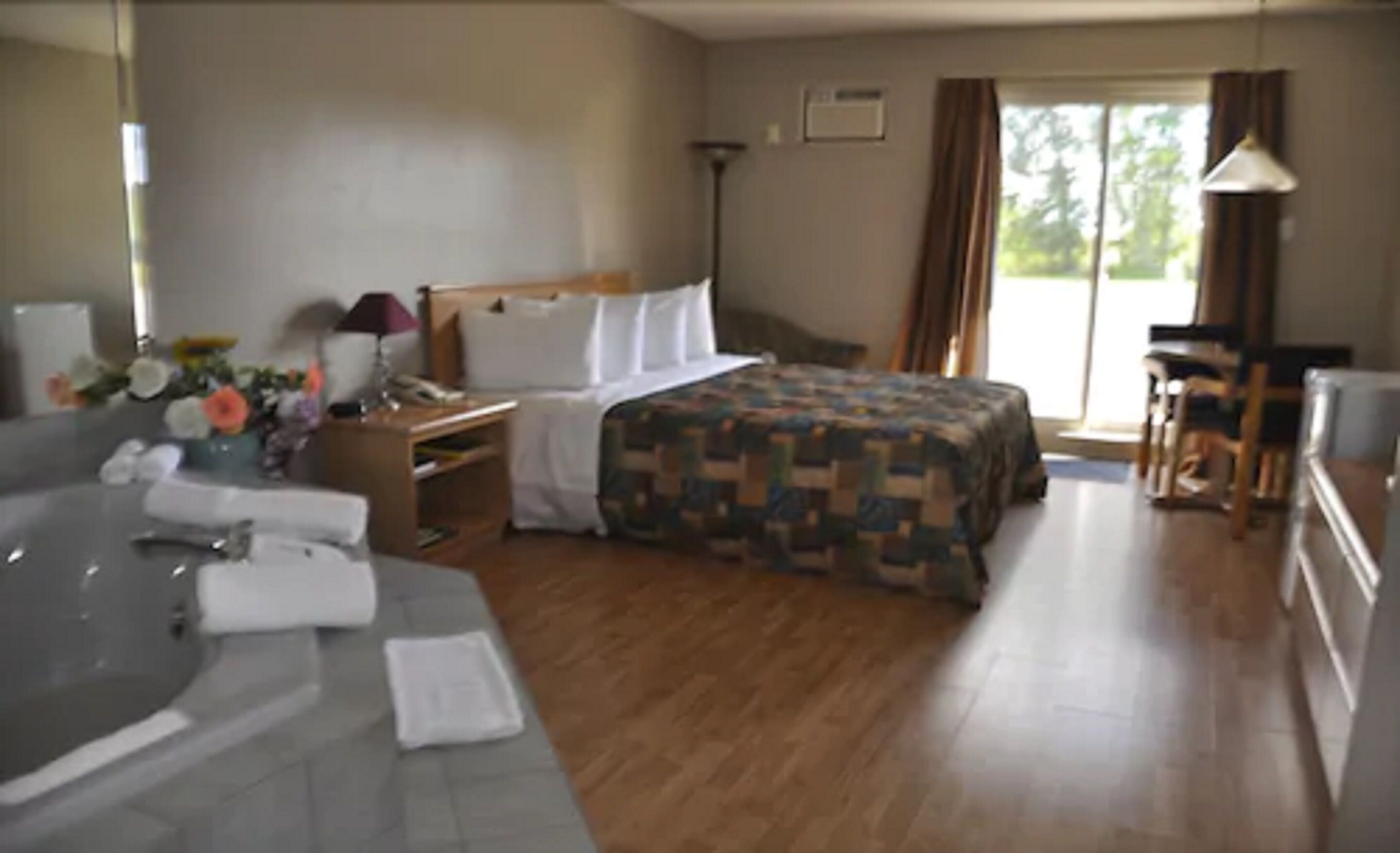 Suite, 1 Queen Bed | Desk, blackout drapes, iron/ironing board, free WiFi