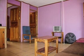 Apartment, 1 Double Bed, Pool View (Lila y Amarillo) | Living area