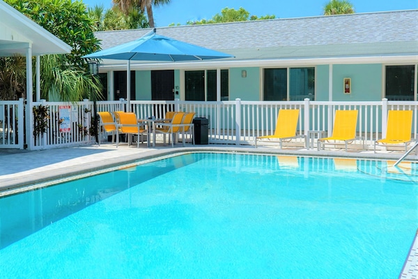 Outdoor pool, open 8:00 AM to 9:00 PM, sun loungers